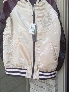 Member only reversible souvenir jacket in a beautiful, silky satin.